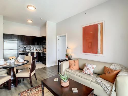 a living room with a couch and a table at Pet friendly in Orlando area near Disney and ESPN Center in Orlando