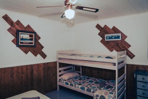 Ένα ή περισσότερα κρεβάτια σε δωμάτιο στο Hostel Blue Lagoon