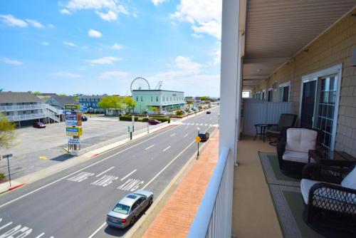 a balcony with a view of a street at Sea Bright 205 condo in Ocean City