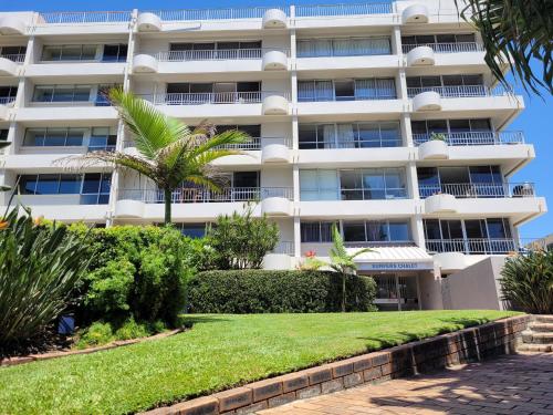 a view of the hotel from the gardens at Surfers Chalet in Gold Coast