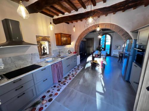 Virtuvė arba virtuvėlė apgyvendinimo įstaigoje Casale Saundarya - yoga e ayurveda in Toscana