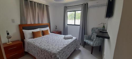 Postel nebo postele na pokoji v ubytování Graditi Valley Residence