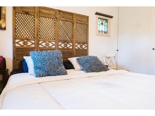 Postel nebo postele na pokoji v ubytování Amazing holiday home in Goedereede with garden