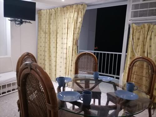 Un lugar para sentarse en Suites a pie de playa