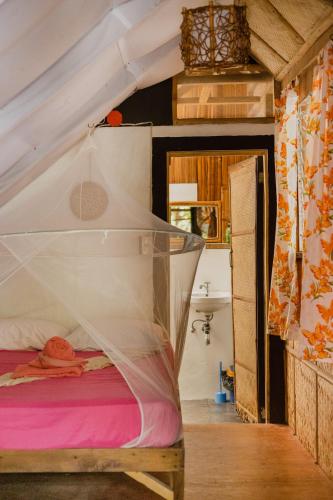 Postel nebo postele na pokoji v ubytování Amami Beach Resort