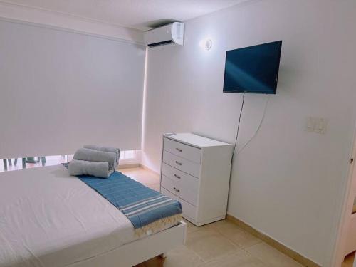 Μια τηλεόραση ή/και κέντρο ψυχαγωγίας στο Moderno Apartamento en San Andres Islas