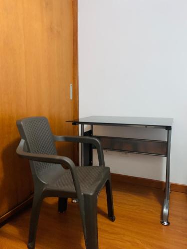 a chair sitting in front of a desk at Bogotá Kings 300 in Bogotá