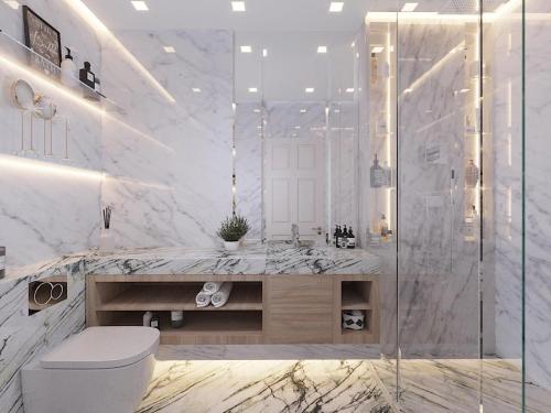 a white bathroom with a toilet and a sink at 4 Bedrooms Villa, Hugh Street Central London in London