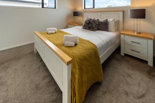 En eller flere senge i et værelse på 1 Bedroom Central City Escape