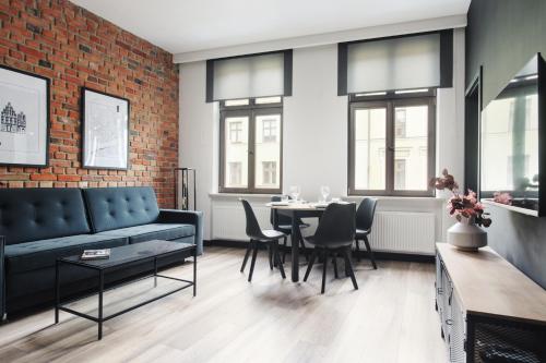Manpro Apartments Toruńにあるシーティングエリア