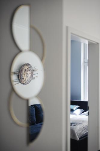 Manpro Apartments Toruńにあるベッド
