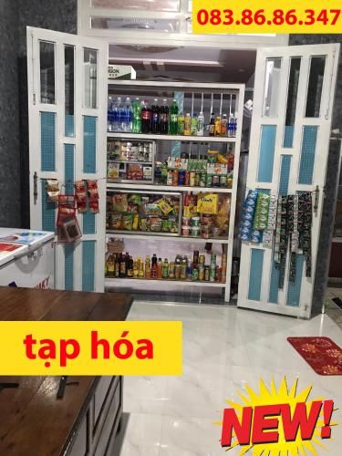 a refrigerator filled with lots of food and drinks at Nhà Nghỉ Năm Bé in Xuyên Mộc