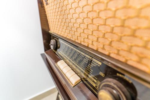 a close up of a toaster oven with its door open at Mama Tita Rooms and Breakfast in Palermo