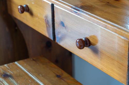 a close up of a wooden drawer with a knob at Arianna apartment 10 in Paleokastritsa