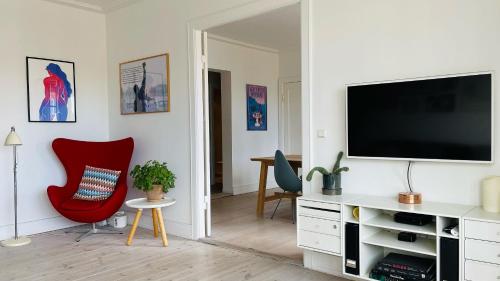 En TV eller et underholdningssystem på ApartmentInCopenhagen Apartment 80