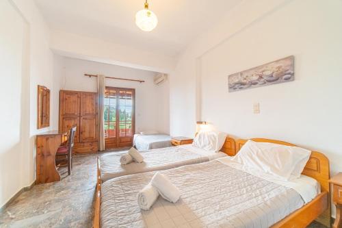 Posteľ alebo postele v izbe v ubytovaní Arianna Studio Ground Floor 8
