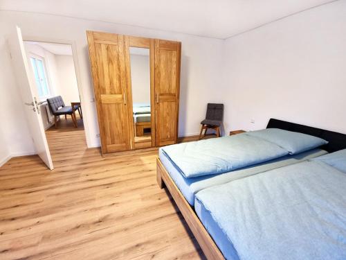 Ένα ή περισσότερα κρεβάτια σε δωμάτιο στο Ferienhaus Lucia
