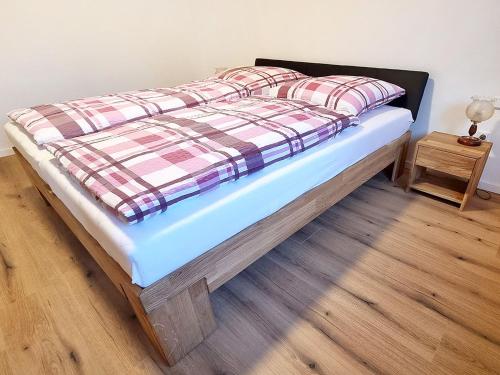 Ένα ή περισσότερα κρεβάτια σε δωμάτιο στο Ferienhaus Lucia