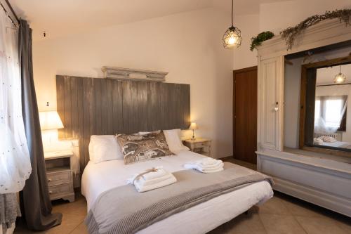 Säng eller sängar i ett rum på Rubini Uno Guest House