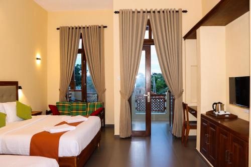 Postel nebo postele na pokoji v ubytování Paddyway Resort