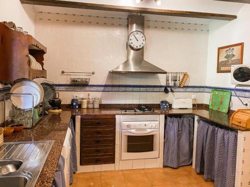Kjøkken eller kjøkkenkrok på Villaestanque