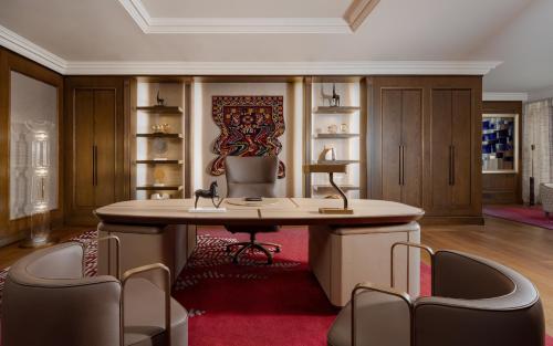 an office with a desk and chairs in a room at The Ritz-Carlton, Baku in Baku