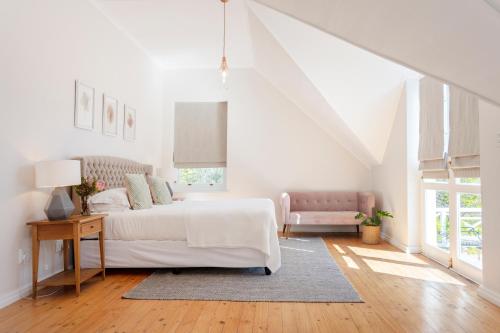 Кровать или кровати в номере Rozendal Stay