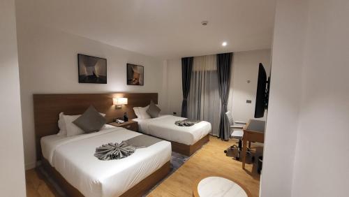 Ένα ή περισσότερα κρεβάτια σε δωμάτιο στο Hayes Hotel, Addis Ababa