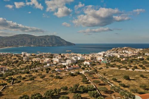 an aerial view of a city and the ocean at Karpathos City View Apartments in Karpathos