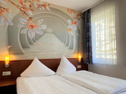 Säng eller sängar i ett rum på Appartementhaus Sonnenschein