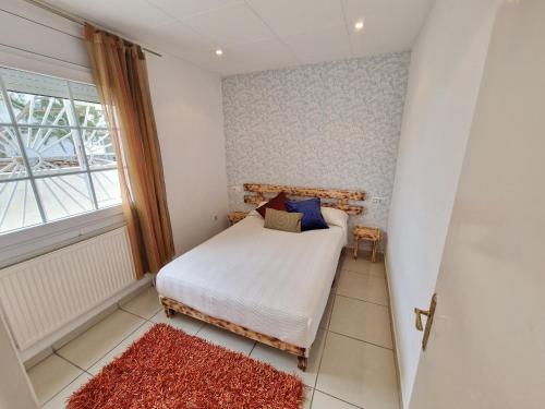 Ένα ή περισσότερα κρεβάτια σε δωμάτιο στο Villa Promenade Terrace