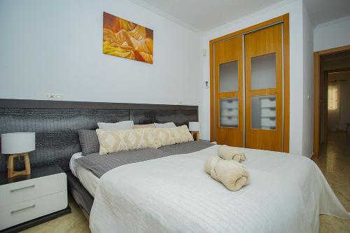 เตียงในห้องที่ 242 Relax & Enjoy Alicante Holiday