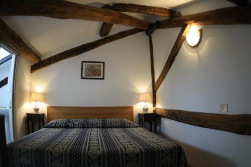 Säng eller sängar i ett rum på Agriturismo Podere Novo