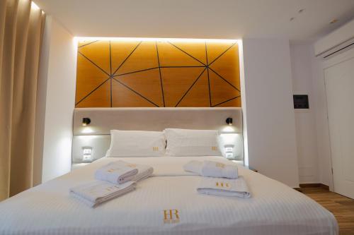 Postel nebo postele na pokoji v ubytování HOTEL RENATO