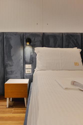 Postel nebo postele na pokoji v ubytování HOTEL RENATO