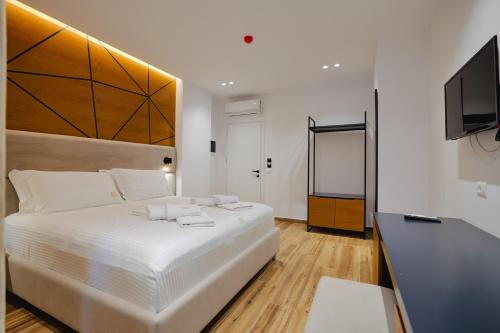Postel nebo postele na pokoji v ubytování HOTEL RENATO
