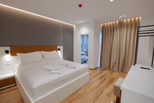 Postel nebo postele na pokoji v ubytování HOTEL RENATO