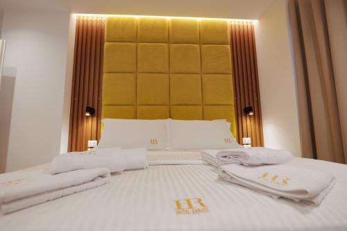 Postel nebo postele na pokoji v ubytování HOTEL RENATO