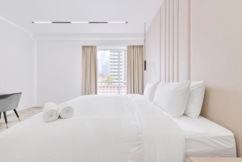Postel nebo postele na pokoji v ubytování Stunning 1BR in Bahar near JBR Beach