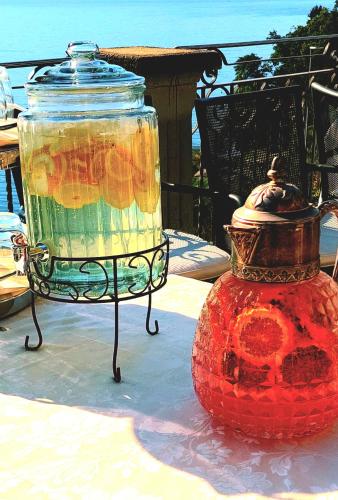 a glass jar sitting on top of a table at Hotel La Rondinella in Cannero Riviera