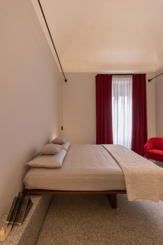 Postel nebo postele na pokoji v ubytování 206 Via Roma