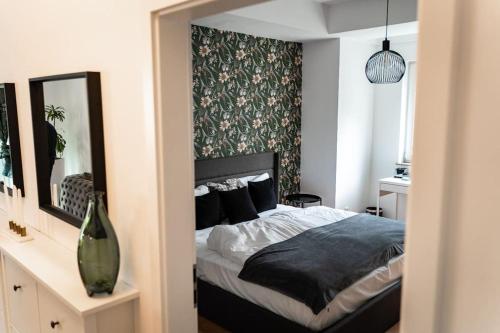 Katil atau katil-katil dalam bilik di Moderne Wohnung im Herzen Offenbachs