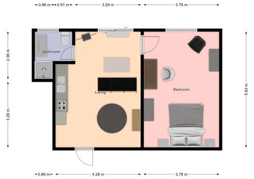 a floor plan of a small house with a chair at Twodogfolly at Creeklands in Armidale