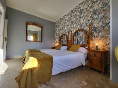 Postel nebo postele na pokoji v ubytování Resort Suites Vecindario