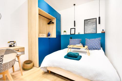 Posteľ alebo postele v izbe v ubytovaní Andy Home - Cosy studio near the Eiffel Tour