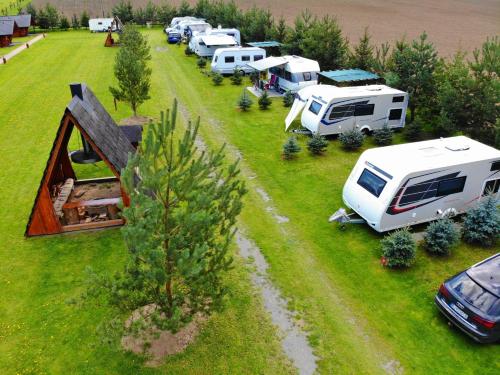an aerial view of a group of parked rvs at Ubytovanie Koliba Pacho - Zrub Anicka in Prievidza