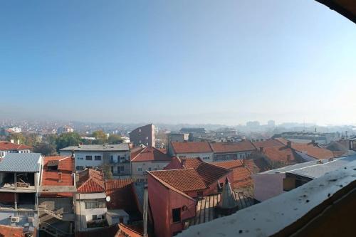 a view of a city with red roofs at Vranje City Center, Penthouse Delux Apartment in Vranje