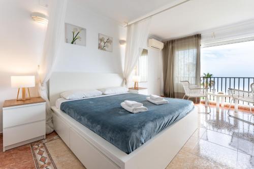 Ένα ή περισσότερα κρεβάτια σε δωμάτιο στο Sea Front Beach House Sandra D