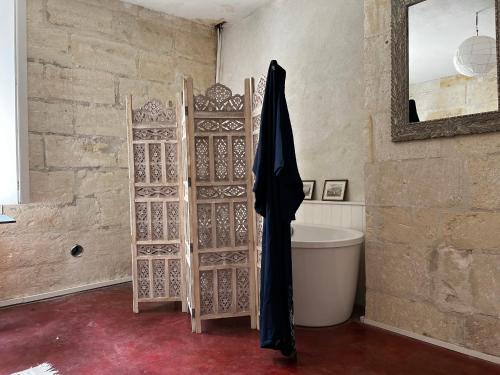 Et badeværelse på The Old Priory Beaucaire