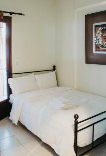 Obrava Guesthouse Kotroni Trikalonにあるベッド